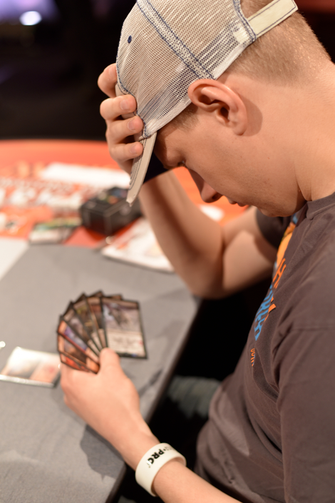 Paul Rietzl agonizes over his cards at the Pro Tour Dragons Of Tarkir event
